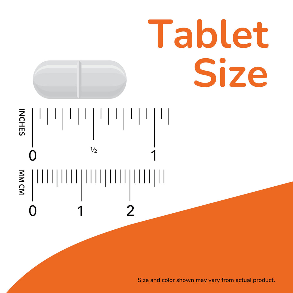 Green chlorella powder and tablets on white surface