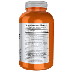 Scoop of beta-alanine powder added to a beverage