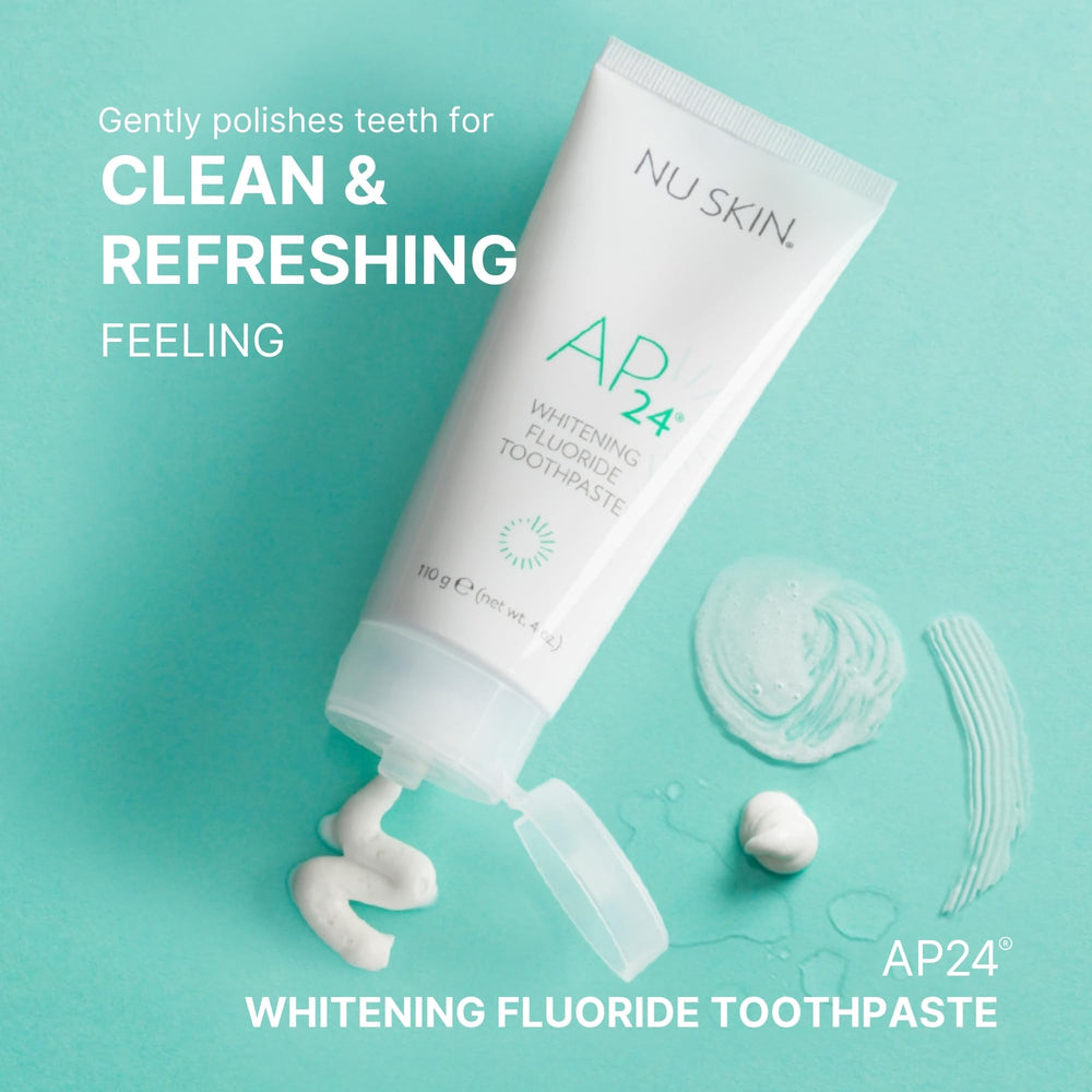 Whitening toothpaste on a clean surface showing bright smile