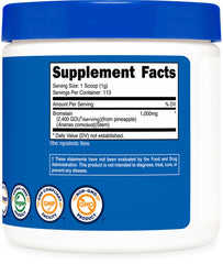 Scooping Nutricost Bromelain Powder to show texture