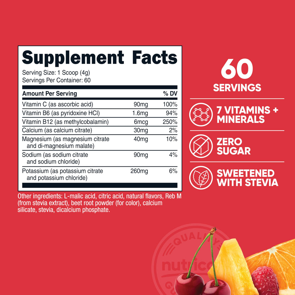 Scoop of powder and glass of fruit punch hydration