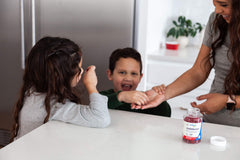 Lifestyle image featuring the gummies and strawberry theme