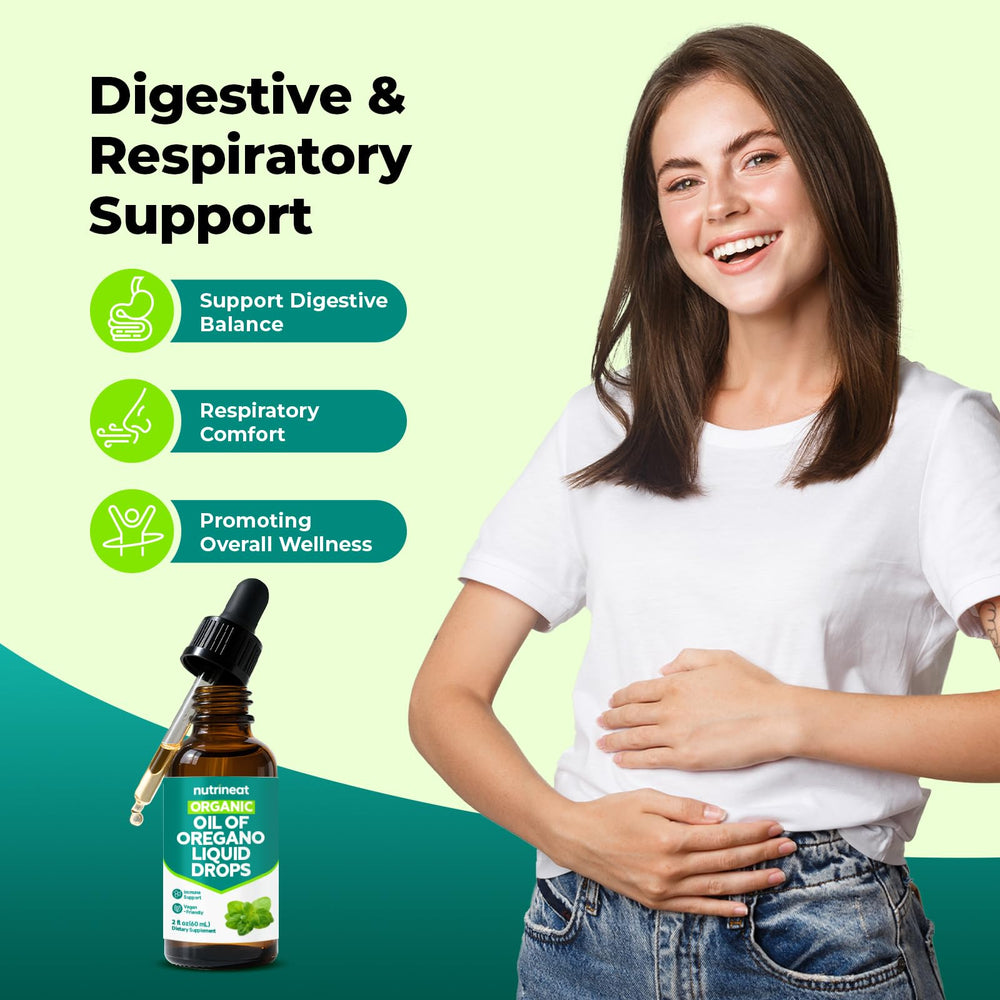 Close-up of dropper dispensing oregano oil drops