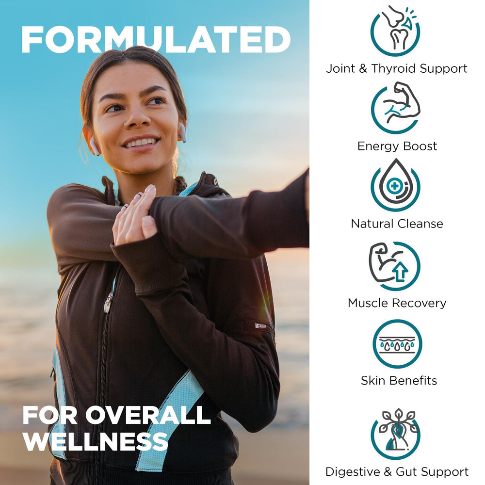 Sea moss capsules in a glass spoon