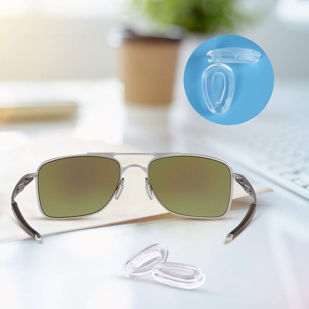 Packaging shows 12 pairs of clear Oakley nose pads