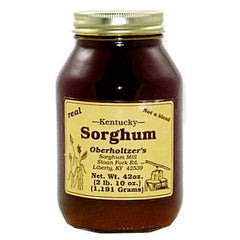 Oberholtzer's Kentucky Sorghum label closeup highlighting pure, all-natural ingredients for desserts.