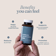 Digestive health concept with capsules and botanicals