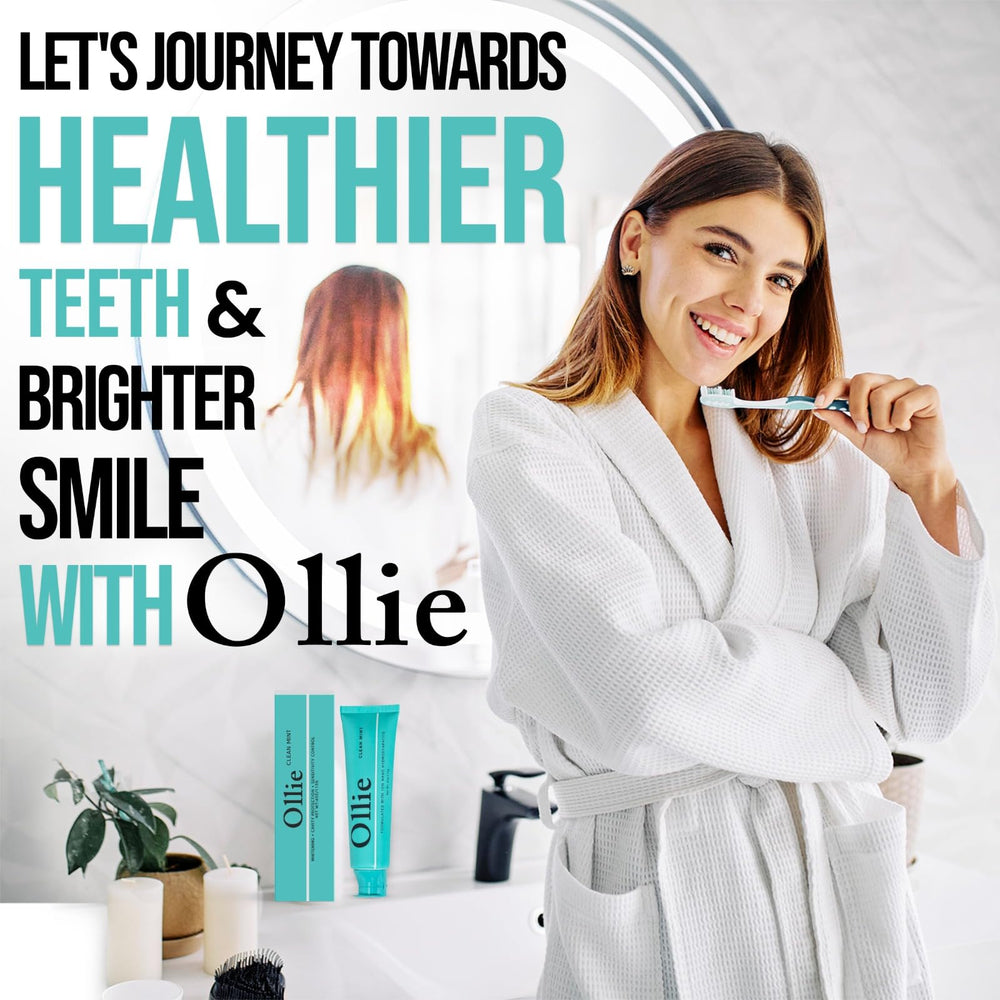 Ollie toothpaste on bathroom counter with fresh mint leaves