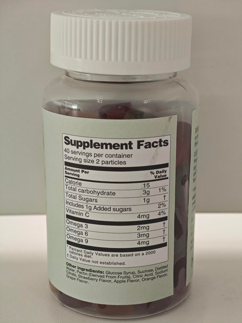 Close-up of Omega 3-6-9 gummies showing texture and color