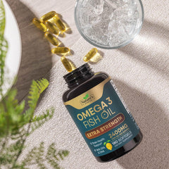 Pouring omega-3 fish oil softgels from bottle