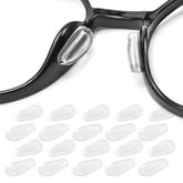 Close-up of Omnful adhesive eyeglass nose pads in clear color with air bag design