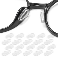 Close-up of Omnful adhesive eyeglass nose pads in clear color with air bag design