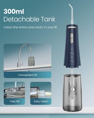 Compact blue water flosser in travel setup