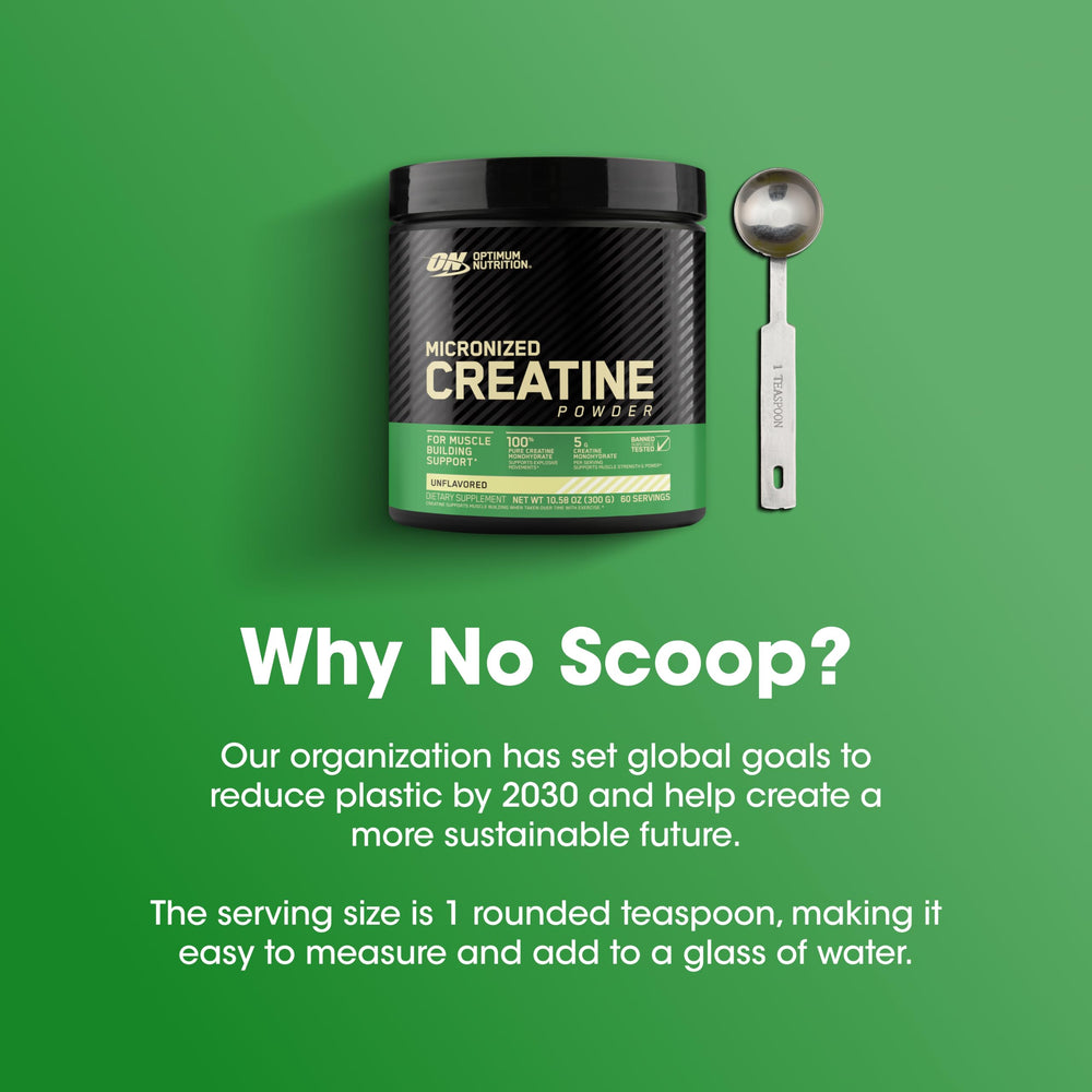 Measuring spoon scooping creatine powder
