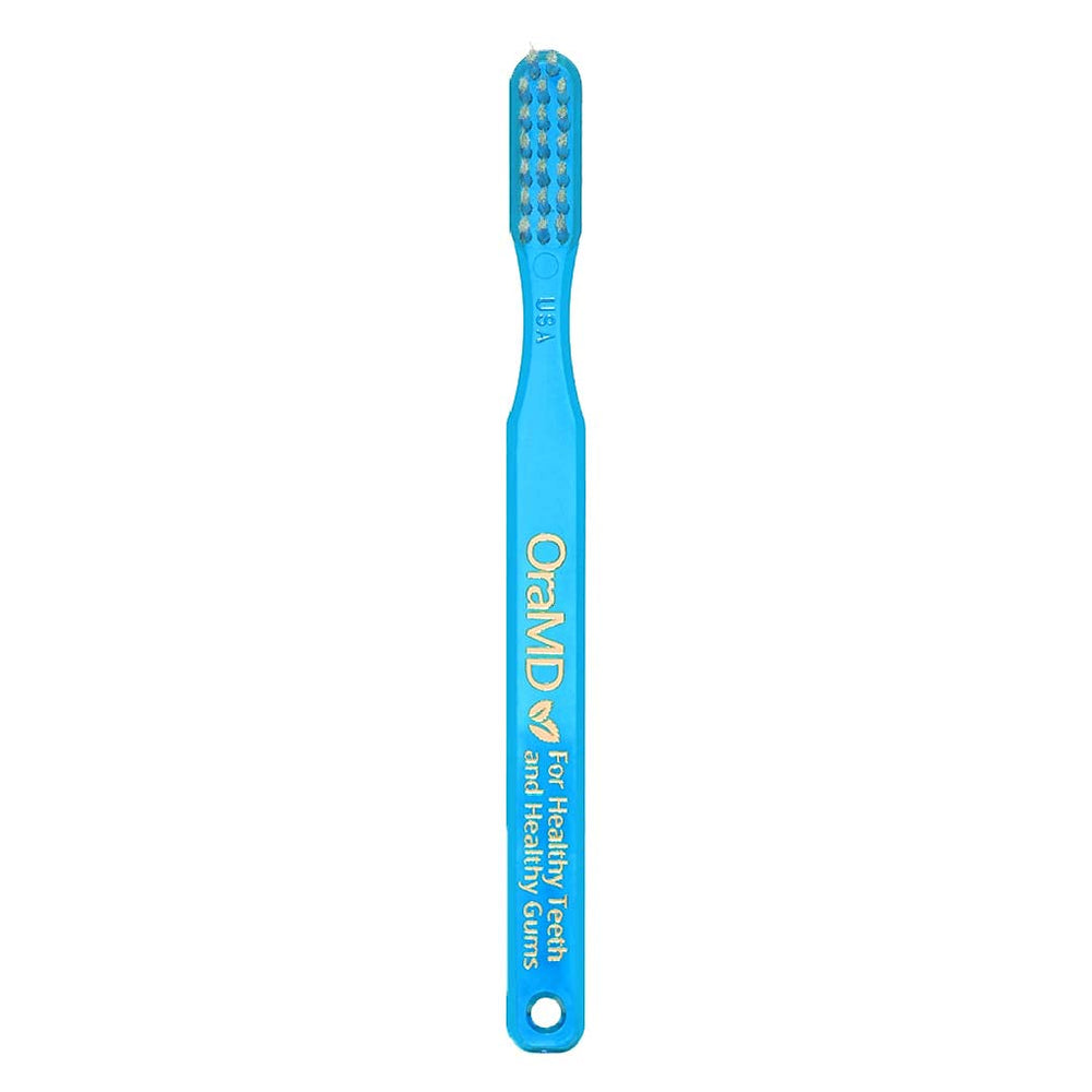 Six-pack OraMD toothbrushes in packaging