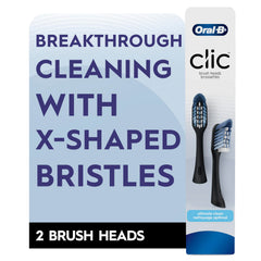 Oral-B Clic replacement heads held in hand