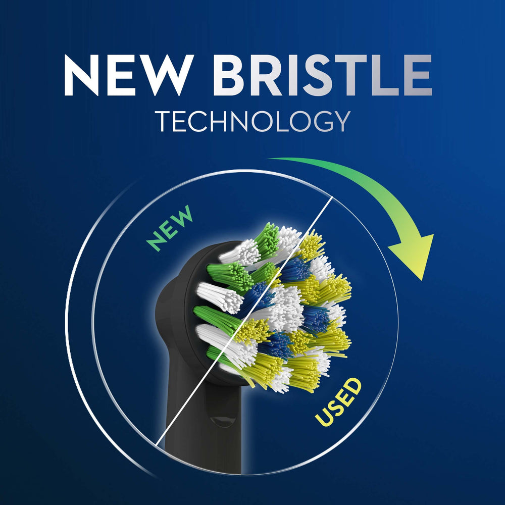 Three Oral-B Cross Action Black replacement brush heads arranged together