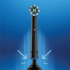 Four black replacement brush heads lined up for Oral-B electric toothbrushes