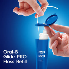 Usage shot showing floss between teeth with Glide PRO Refill