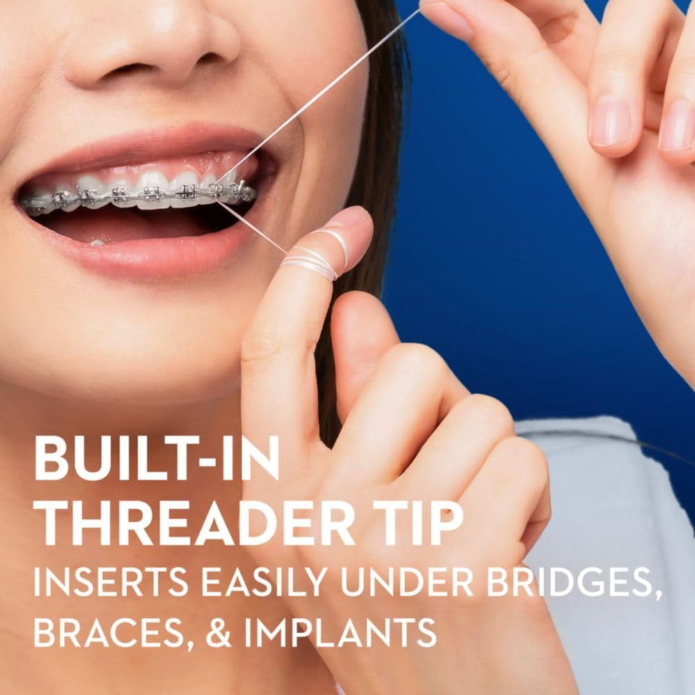 Floss being threaded under braces