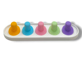 Pastel yellow Oral-B iO head holder with 5-head capacity on bathroom counter