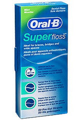 Close-up of Oral-B Super Floss Mint premeasured strands showing 50 per pack