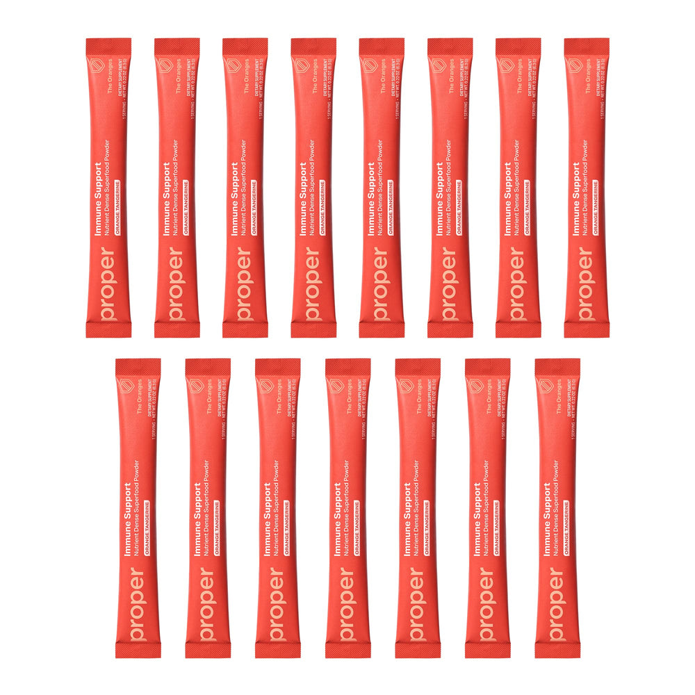 Orange Tangerine drink mix being stirred into a glass