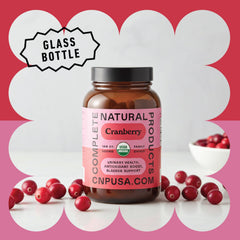 Cranberry capsules with natural ingredients on a white surface