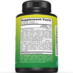 Close-up of greens tablets with fruits and vegetables imagery