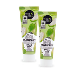 Organic Shop toothpaste on bathroom shelf suggesting clean-beauty routine