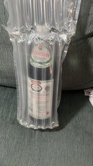 Herbal ingredients surrounding Jigsimur drink bottle