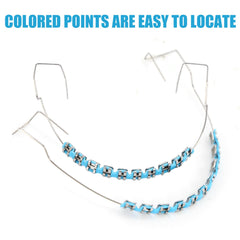 Blue orthodontic brackets kit with wire and glue for demonstration.