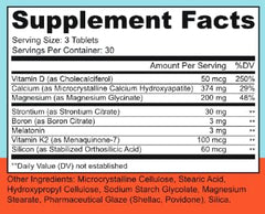 Hands holding Osteo Awesome capsules demonstrating bone health
