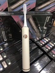 White OUGEER toothbrush with timer and accessories