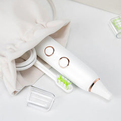 Lifestyle shot of OUGEER Sonic Electric Toothbrush with accessories