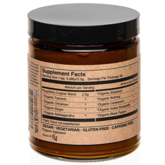 Close-up of turmeric powder and ashwagandha herb