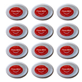 Pack of 12 travel size mint dental floss in a compact pocket case
