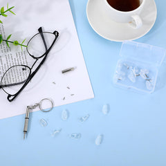 Illustration showing packing list: pads, screws, screwdriver