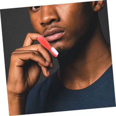PACKOVE finger sleeve toothbrush in use – prisons