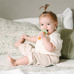 Carrot-shaped baby toothbrush gift-ready presentation