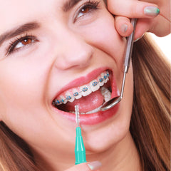 Assorted color interdental brushes packaged in Patelai kit