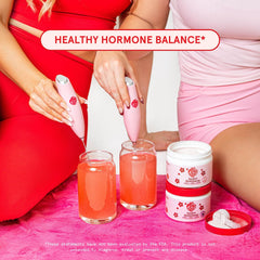 Bottle and scoop of Peach Perfect Inositol Powder