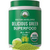 Canister of Peak Performance Organic Greens Powder with label visible