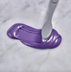 Open tube showing creamy whitening gel