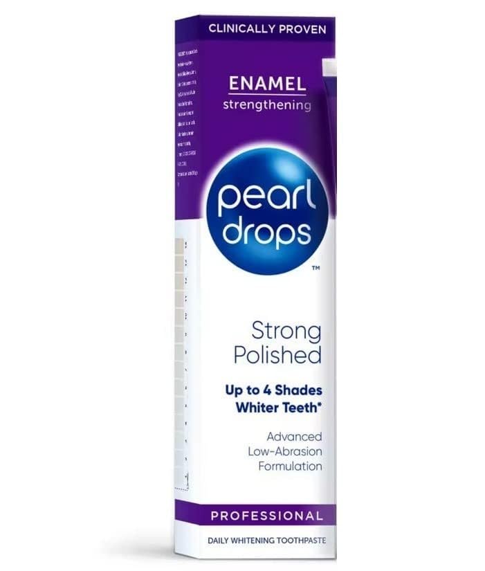 Close-up of Pearl Drops Strong White toothpaste tube and polished mint packaging