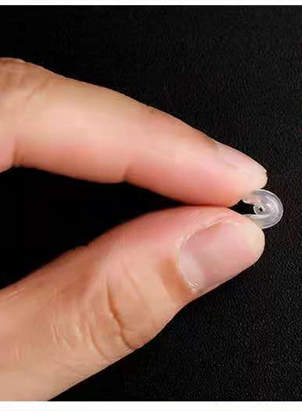 Two clear silicone nose pads for glasses with attachment screws