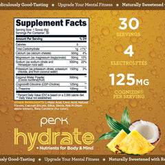 Close-up of Perk Hydrate pina colada mix scoop and glass