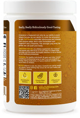 Pina colada flavored electrolyte drink served in glass with coconut water