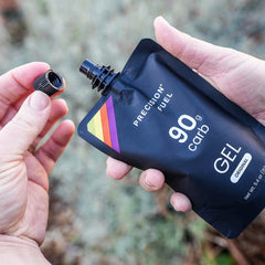 Precision Hydration PF90 Energy Gels during a run delivering convenient, easy-to-digest carbohydrates.