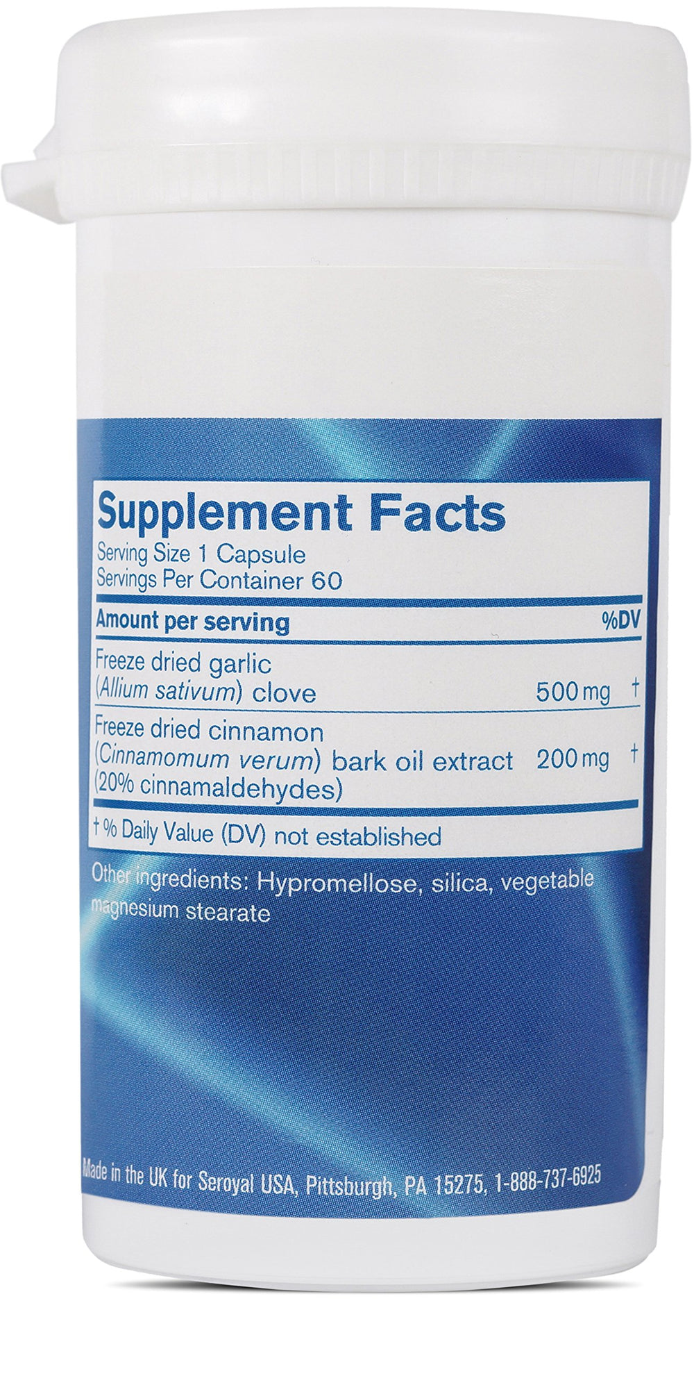 Close-up of garlic cloves and cinnamon bark for Alli-Cinn